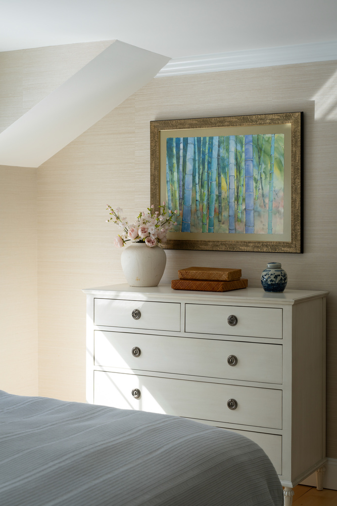 elegant custom home bedroom furniture with framed artwork and decor by Craft Design + Build in Lyme, CT