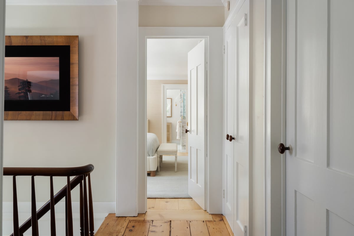 interior hallway leading to custom bedroom and bathroom suite by Craft Design + Build in Killingworth, CT