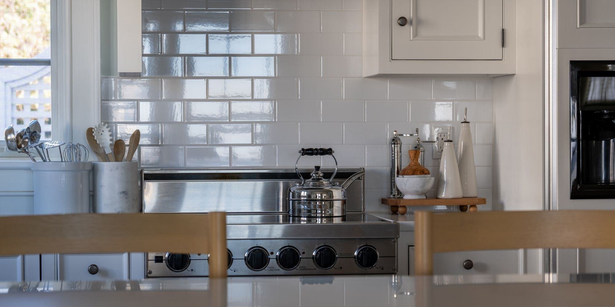 kitchen remodel ct with white subway tile backsplash and stainless steel stove