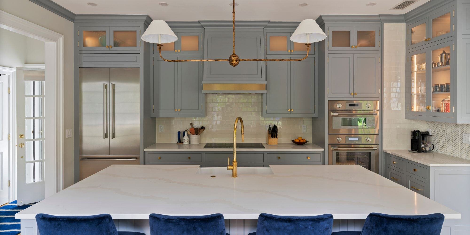 large kitchen island with sink and seating in a custom kitchen remodel in essex ct