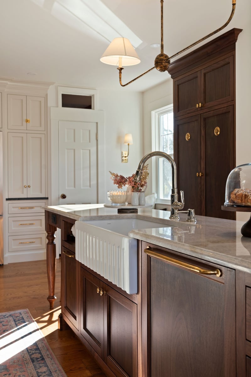 fluted farmhouse sink in a traditional kitchen