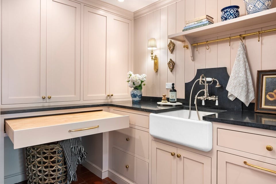 Custom laundry room with pull-out countertop and farmhouse sink, Craft Design Build, Essex, CT