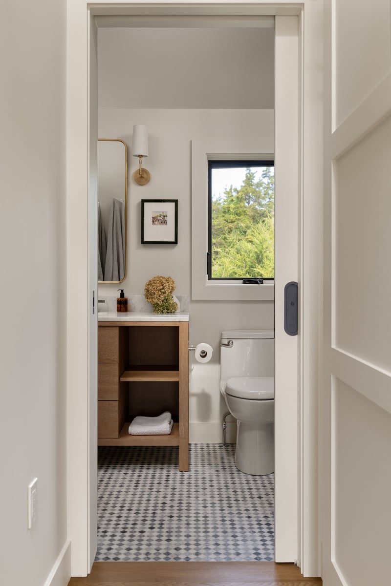house addition bathroom with pocket door and marble mosaic floor guilford ct