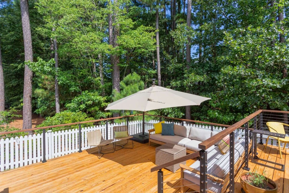 Modern deck remodel in Essex, Connecticut, by Craft Design + Build, featuring comfortable outdoor seating