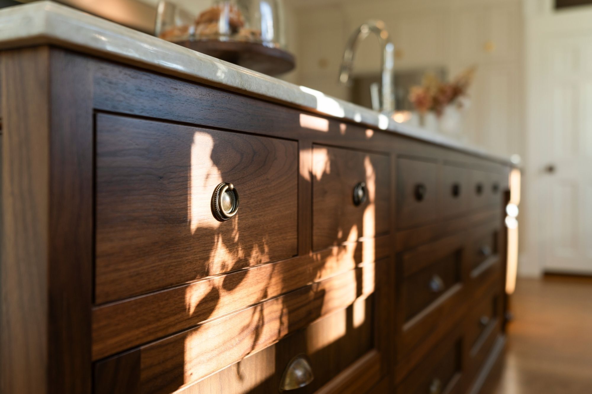 detail shot of wooden kitchen island with restoration hardware in a connecticut kitchen remodel