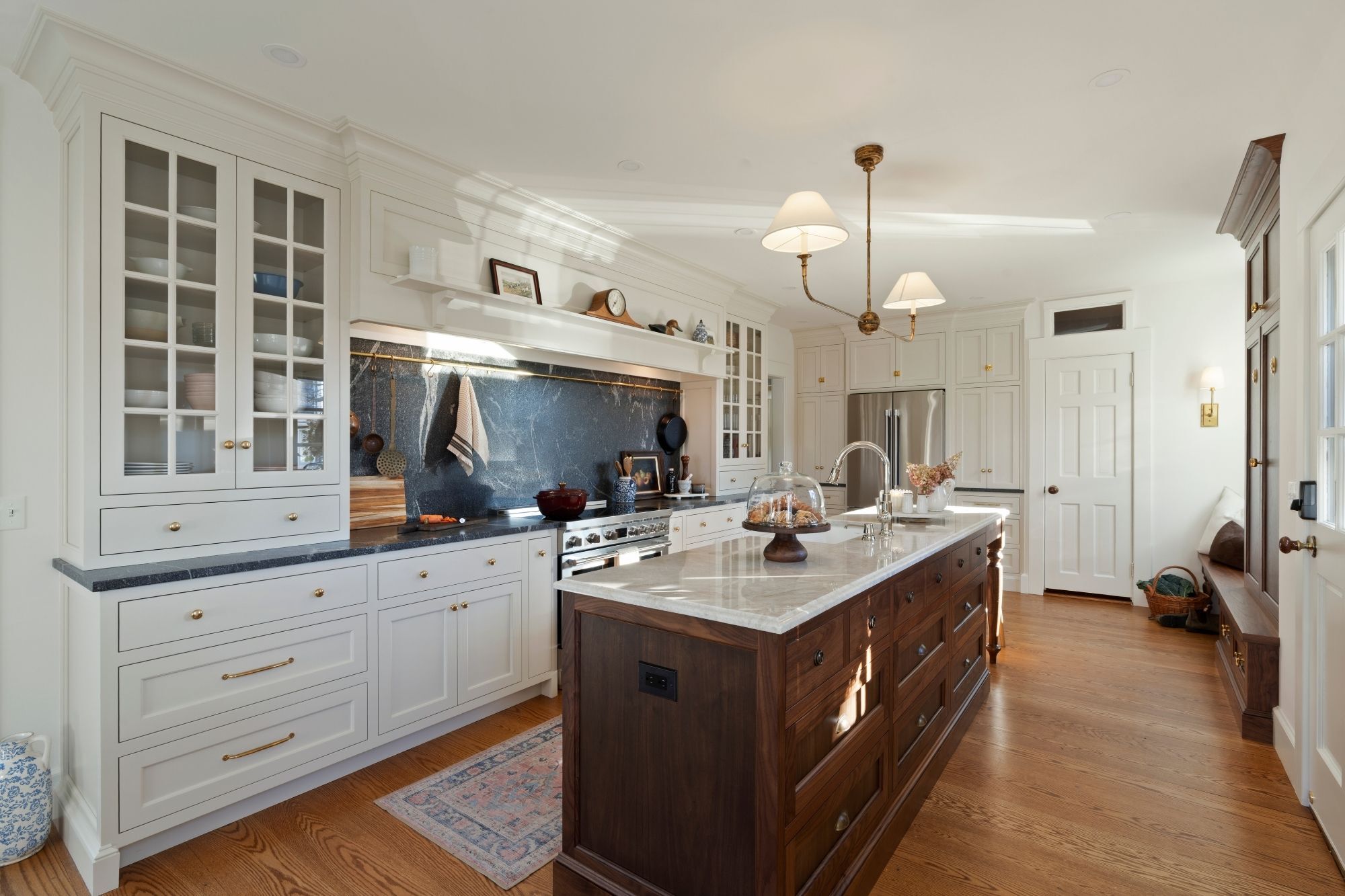 kitchen remodel on the connecticut shoreline with white cabinets and wood kitchen island