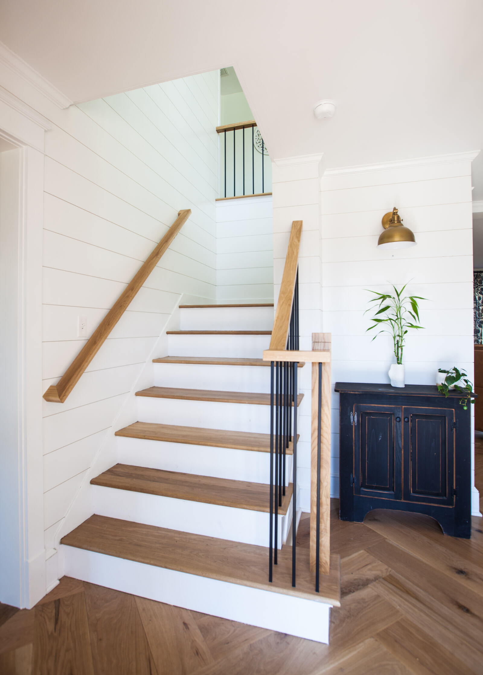 Entryway with custom staircase by Craft Design and Build, Essex, Connecticut