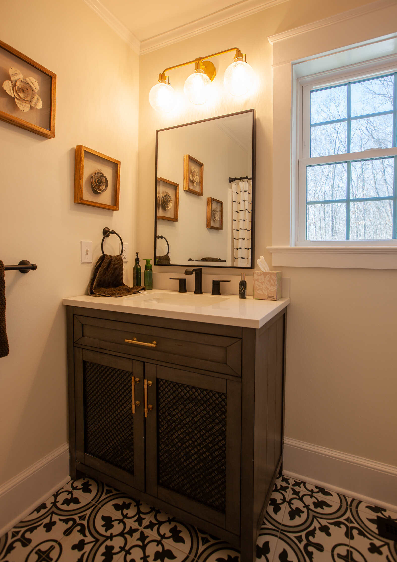 Modern bathroom vanity with decorative mirror by Craft Design and Build, Essex, Connecticut