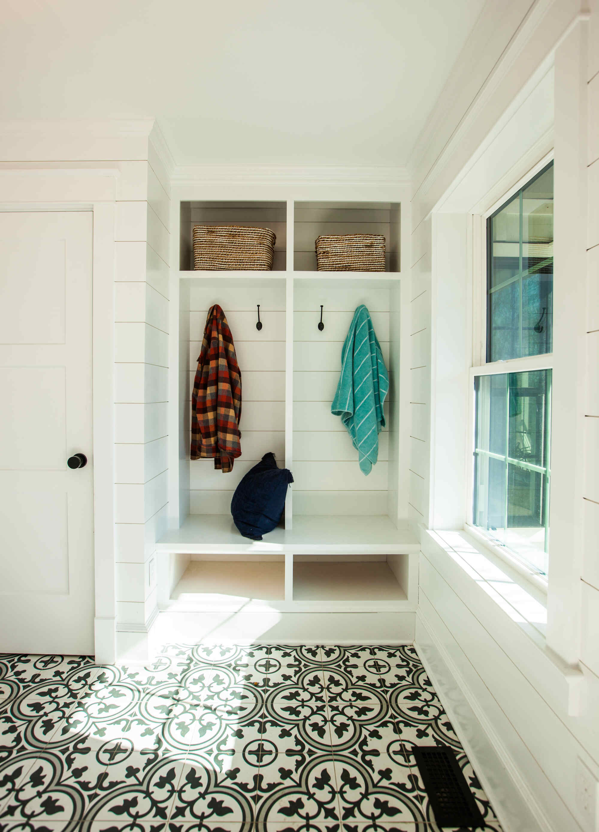 Organized mudroom with built-in storage by Craft Design and Build, Essex, Connecticut